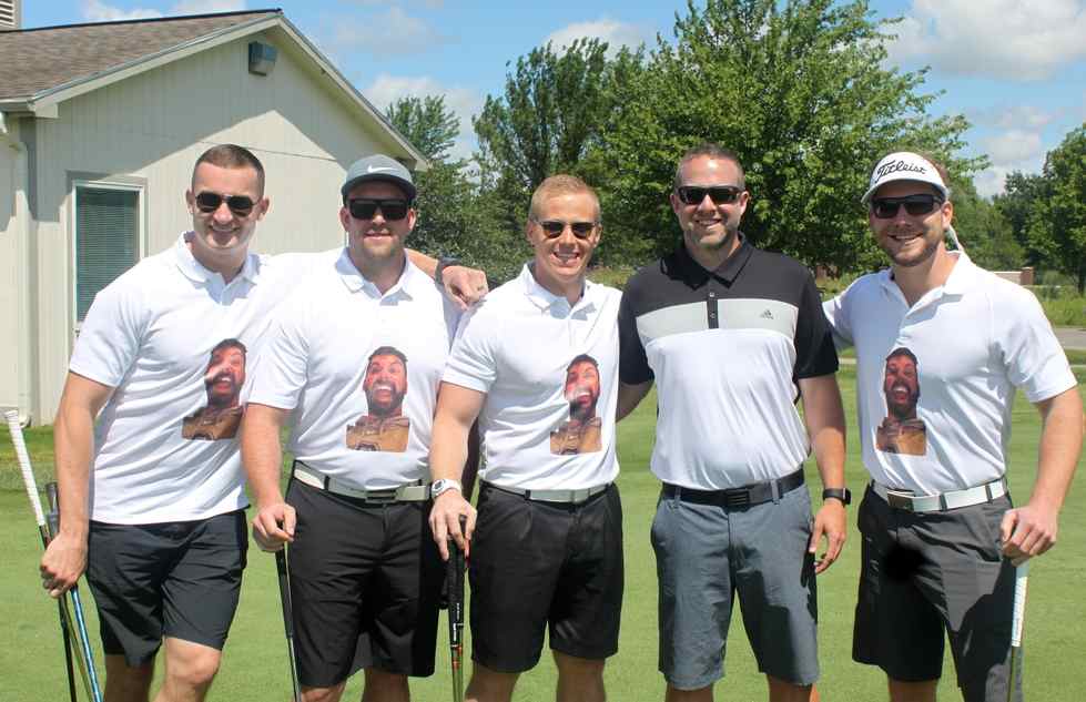 five men on golf course